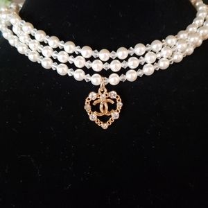 Chanel  pull charm necklace